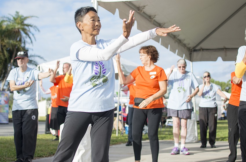 Sharon Akiyama participates in a Tai Chi demonstration during Sarasota's first ever Age Friendly Festival.