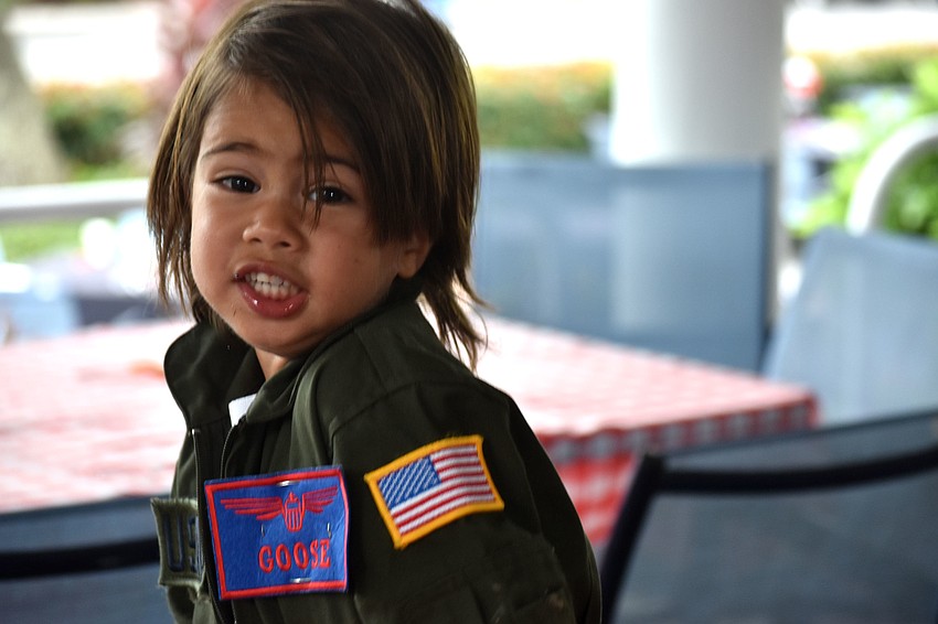Rory Rasool goofs around before carving a pumpkin.