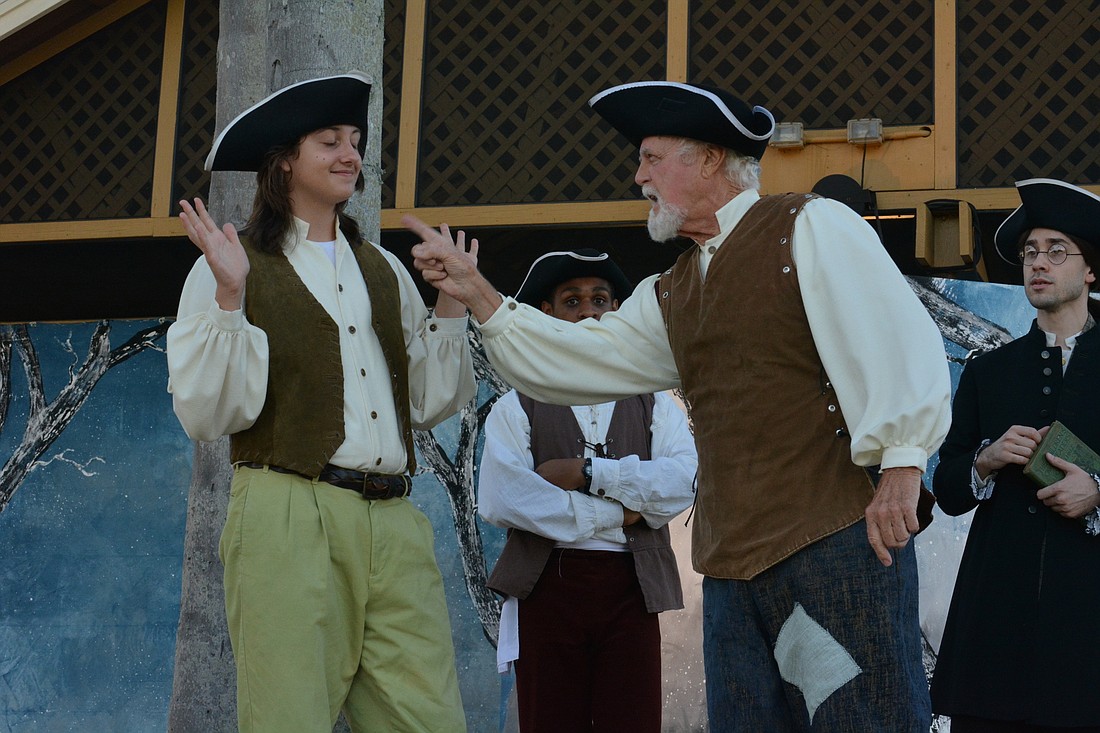 Andrei Nesterenko as Brom Bones gets a stern talking to from Farmer Stuyvesant, portrayed by Bob Fahey.
