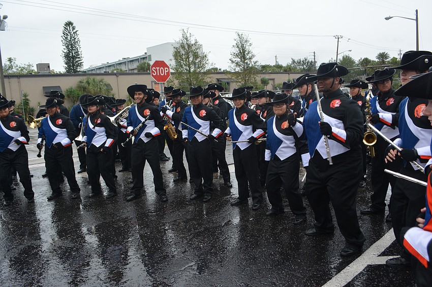 The steady rain never seemed to bother the band, which launched into Kevin's and Shaina's favorite song by Train, 