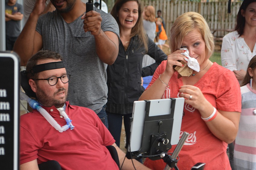 The tears started to flow as Shaina, who is a big Ohio State fan and thought she was attending a viewing party for the football game, was hit by the proposal.