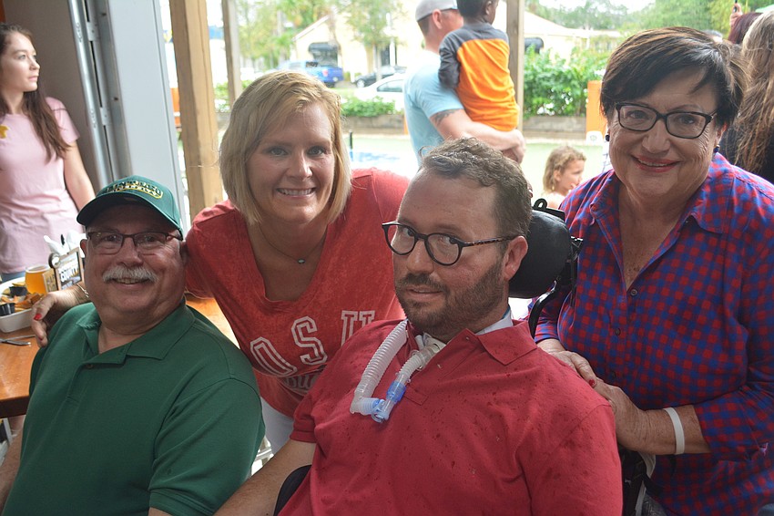It was a day Kevin and Shaina always will remember, along with Kevin's parents Ken (left) and Julie (right).
