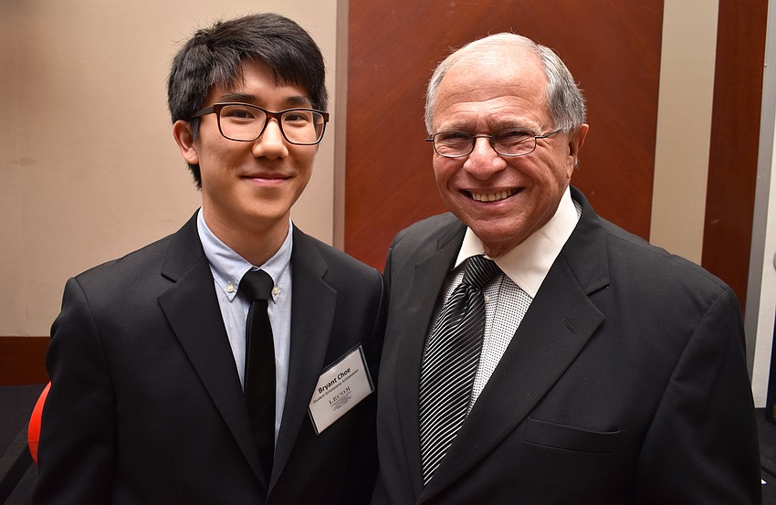 Bryant Choe and Robert George, dean of the LECOM Medical School