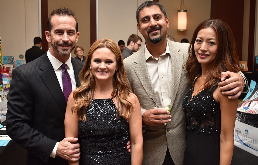 Bryan and Melissa Boudreaux and Dr. Prashant and Yumi Pandya