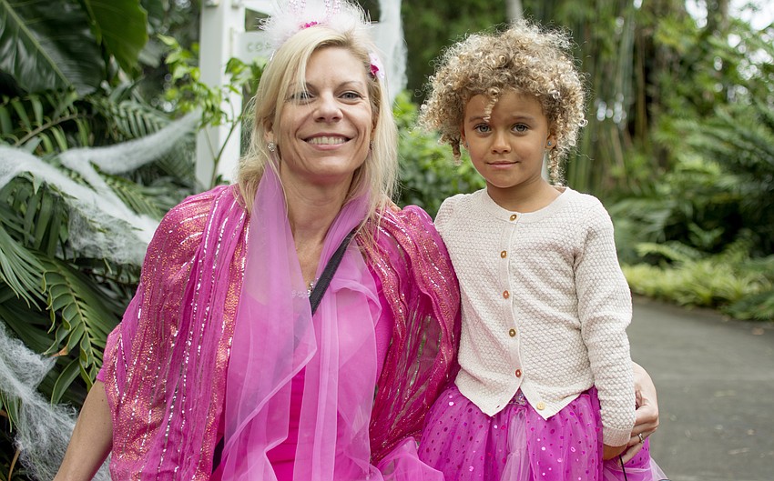 Sheryl and Carolina Cruz pose for a photo during Marie Selby Botanical Garden's Spooktacular event.