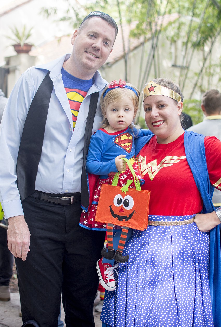Rob, Annalea and Anna Walker wore superhero costumes to Marie Selby Botanical Gardens Spooktacular.