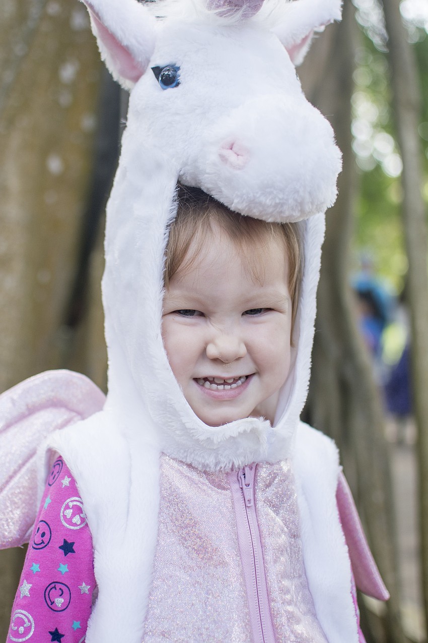 Ruby Walker dressed as unicorn for Marie Selby Botanical Gardens Spooktacular.