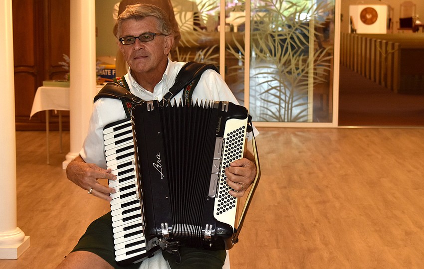 Jim Scherz performed live music during the Oktoberfest lunch.