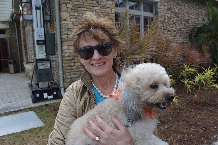 Humane Society Chair Susan Giroux is hoping to find a home for Lily, a 2-year-old Wheaten-Bichon mix.