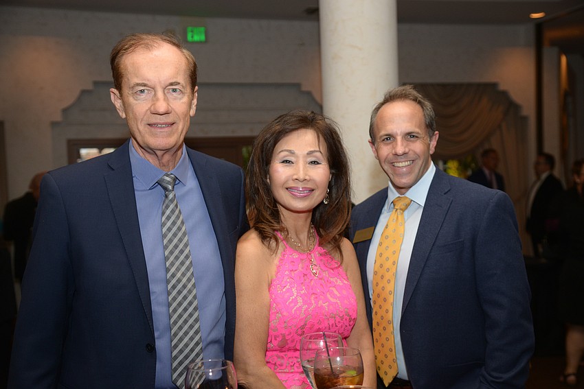 Ozzie and Lynda Patzman with Samuel Lowry