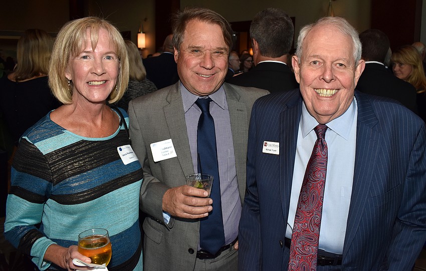 Laura and Jim Paulmann with Michael Furen