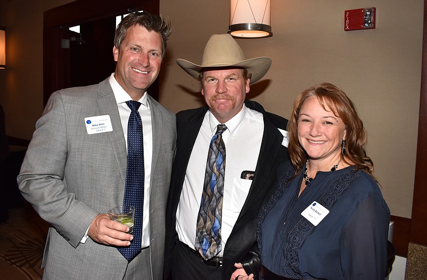 Mike Allen with Bryan and Nicole Bartell