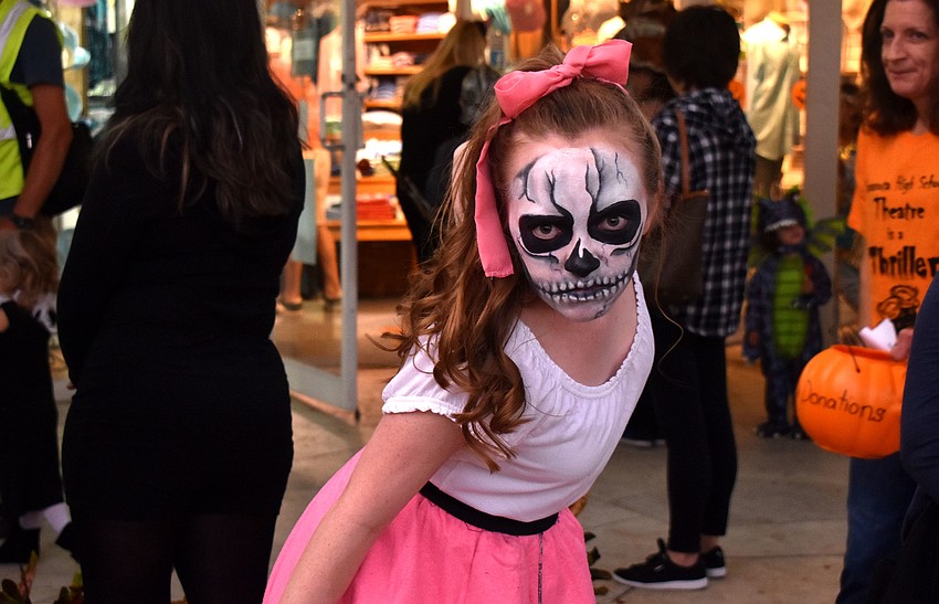 The Sarasota High School Drama Department students circled St. Armands as zombies.