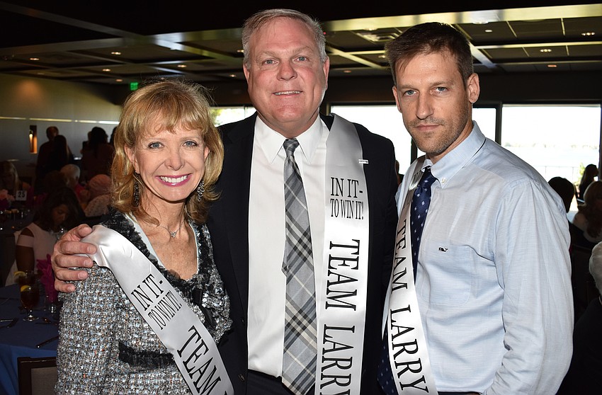 Charlie Ann Syprett, President of Moffitt Foundation Matt Kupec and Adam Kabinoff