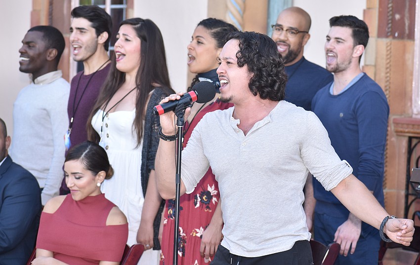 The ensemble performs “And the Money Kept Rolling In.”