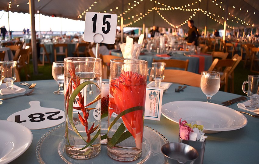 Each table was adorned with a floral centerpiece.