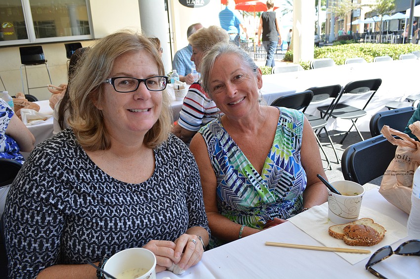 Jennifer Newman, of Lakewood Ranch, joins longtime friend Deborah Mosher, of Sarasota, in their annual soup-eating tradition.
