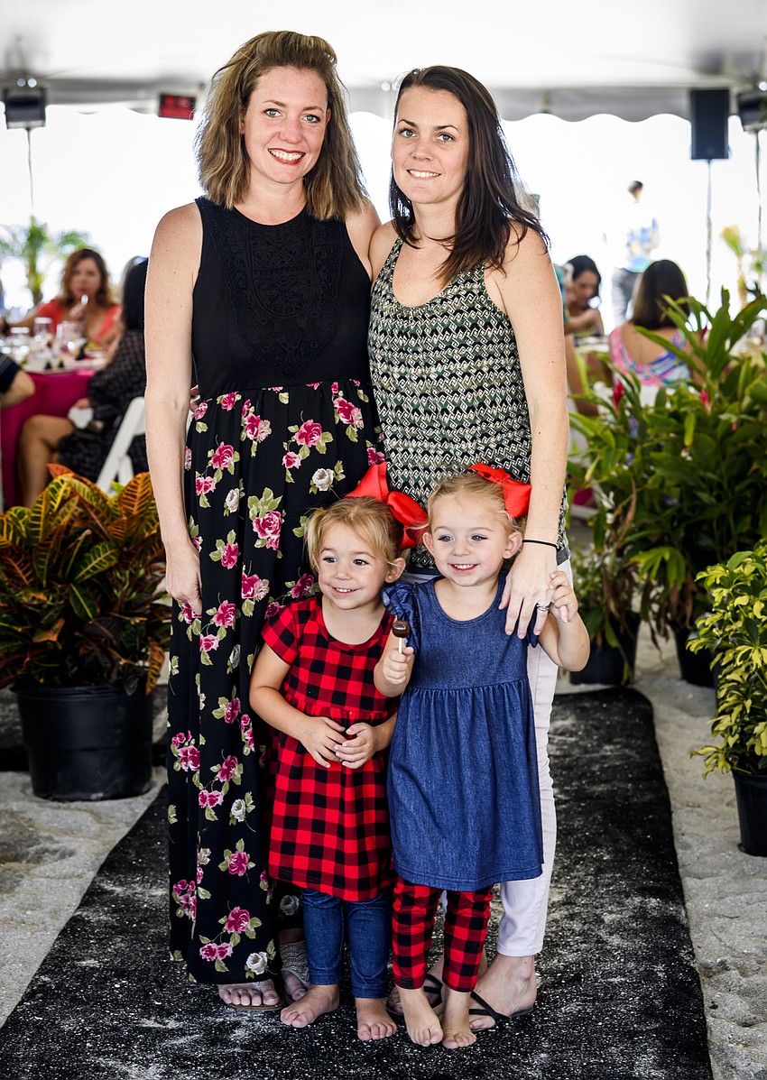 Alana Opie and Marielle Hayes with twins Emmy (l) and Azzi