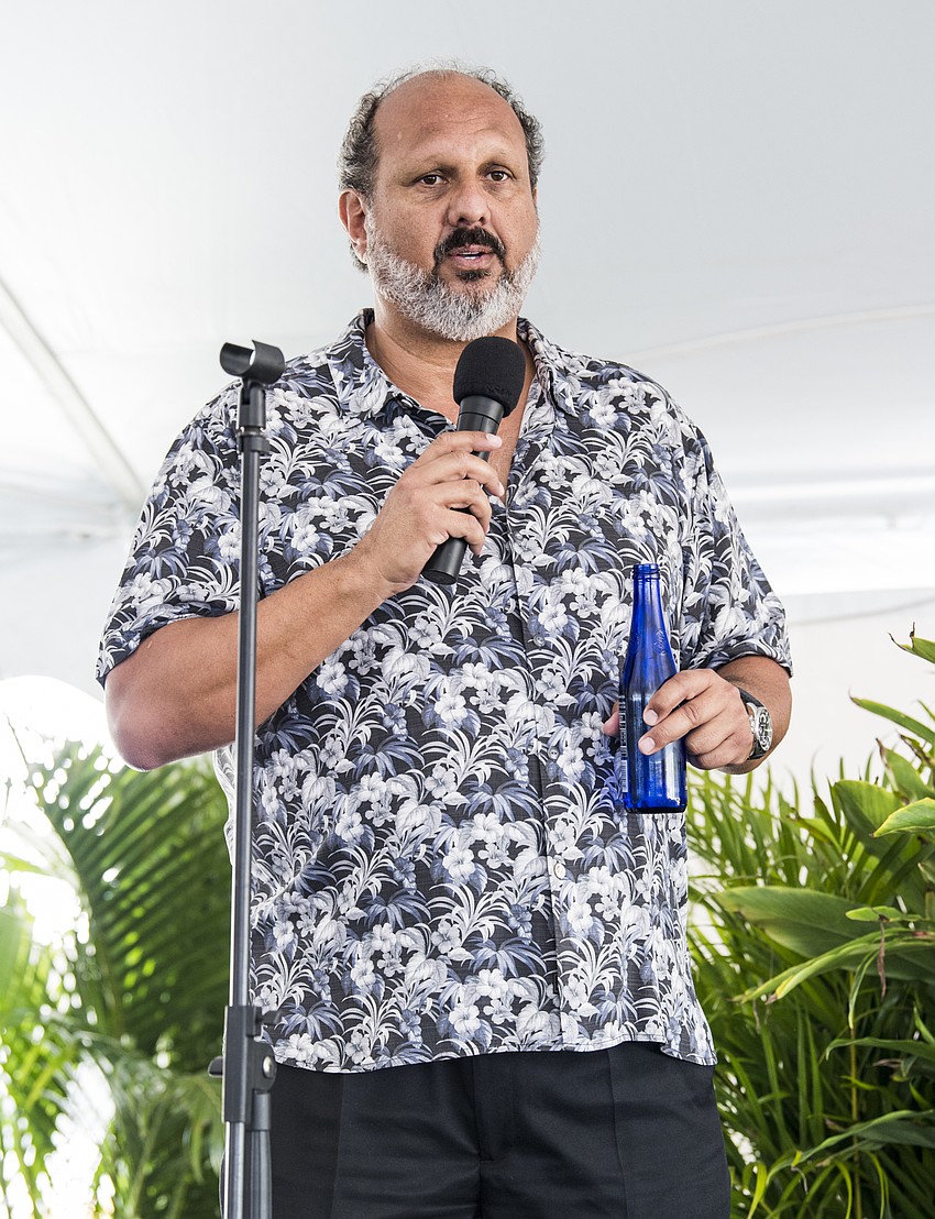 Children First CEO Philip Tavil speaks to guests.