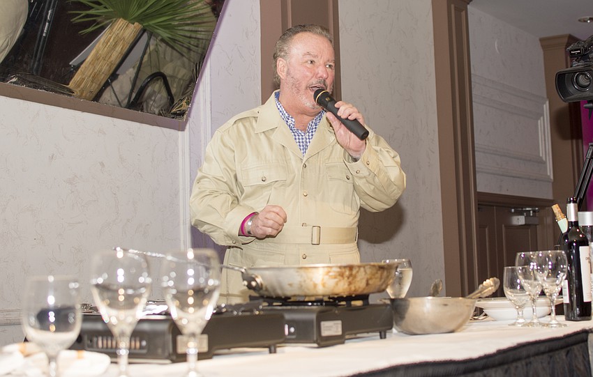 Michael Klauber addresses guests before their cooking experience begins.