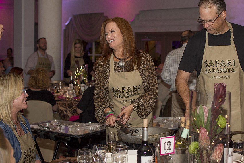 Terri Klauber laughs while participating in the Safari Sarasota interactive dinner.