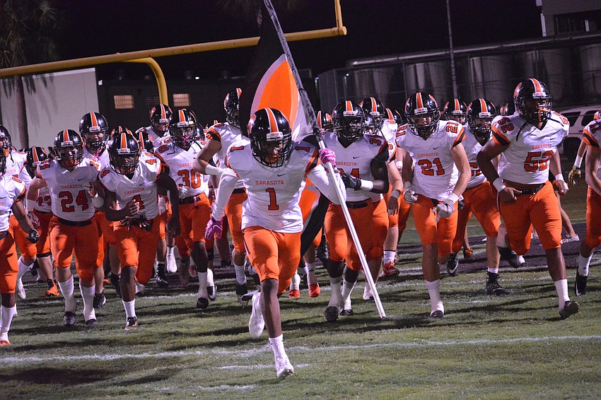 The Sailors rush the field pregame.