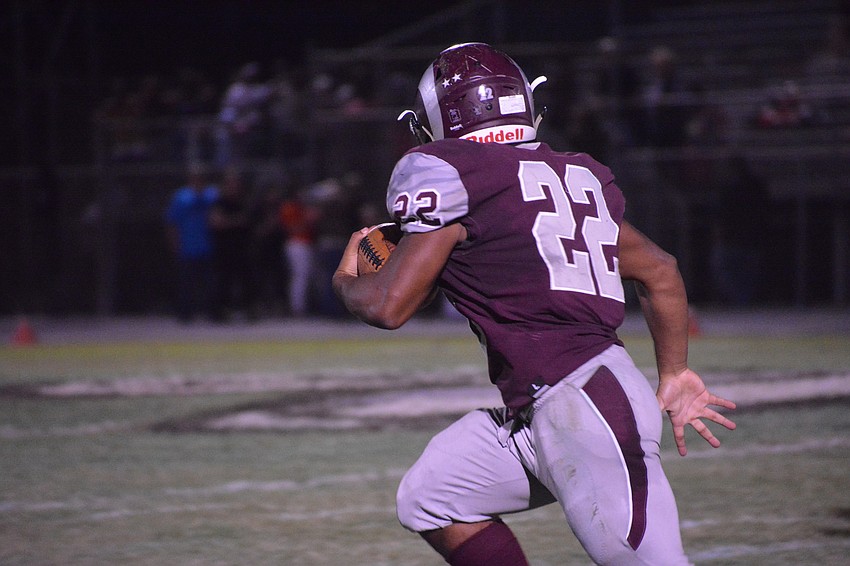 Rams RB Ali Boyce races up the sideline. He would take the ball 85 yards for a score.