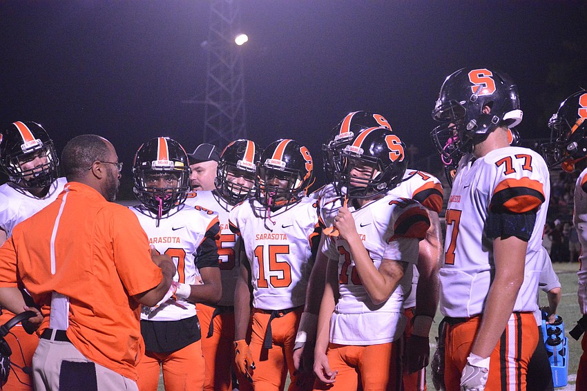 Sailors coach Brian Ryals talks to his offense in the second half.