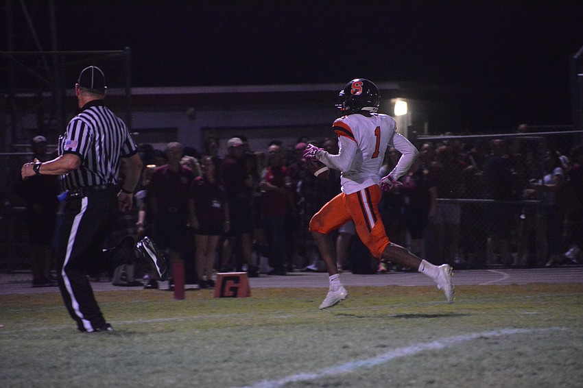 Sailors junior Charles Ward takes a reverse 49 yards for the score.