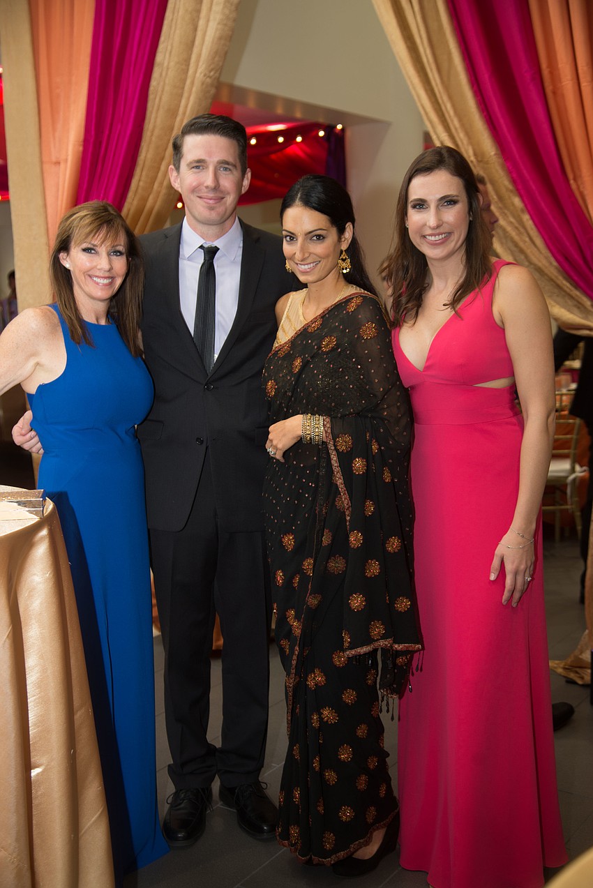 Lisa Cooper, Kyle and Regina Wood with Morgan Calleny