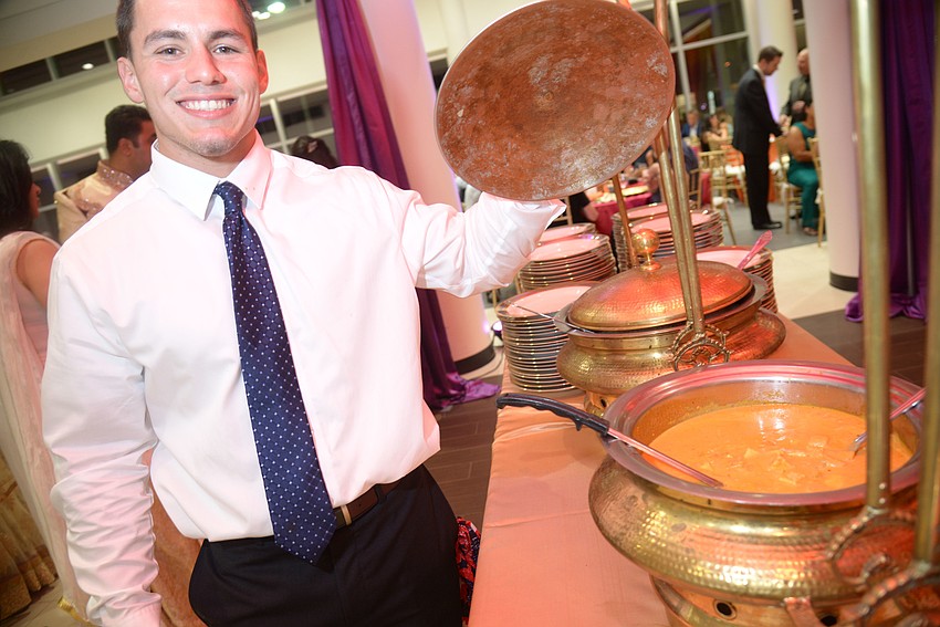 Andre Christinano serves up Indian cuisine.