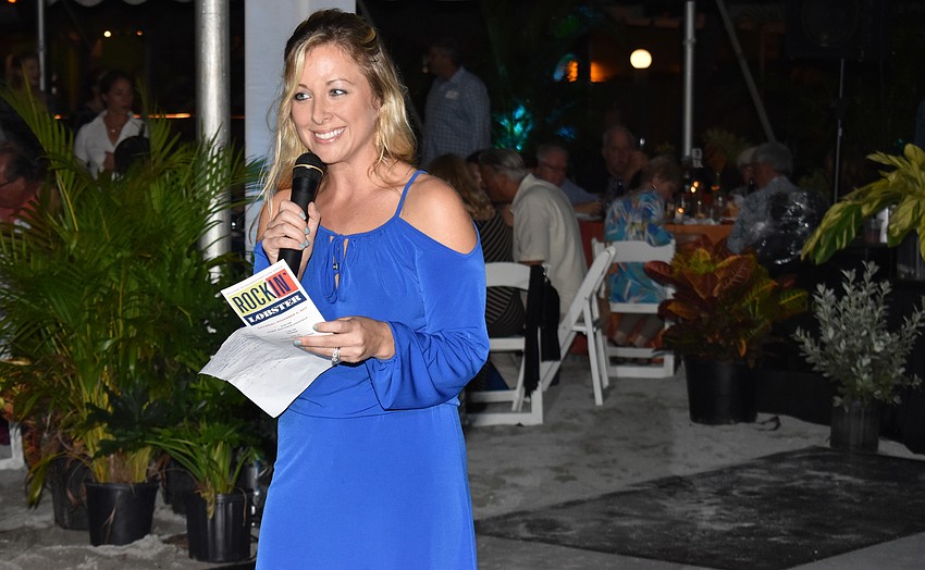 Children First Events Manager Samantha Kingsley welcomes the crowd.