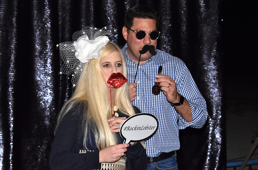 Jenny and Michael Infanti pose in the photobooth.