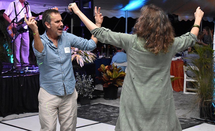 Lance Bergmann dances with Kathleen Sullivan.