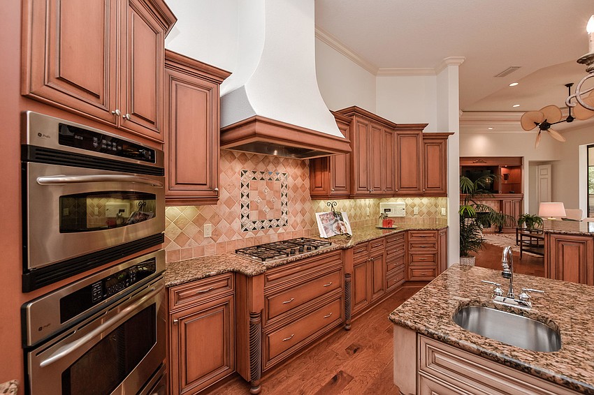 Before shot of the kitchen at 6809 Belmont Court.