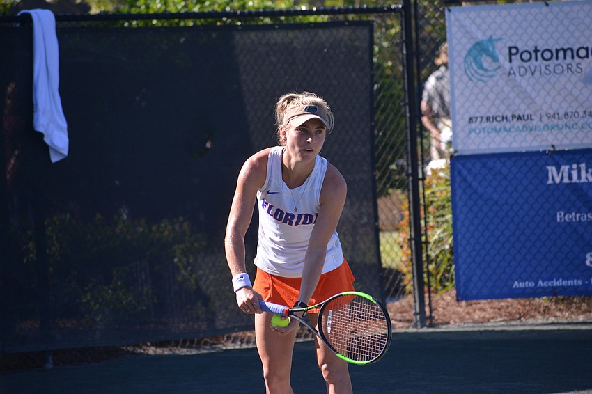 The University of Florida's Josie Kuhlman prepares to serve in the women's singles championship match.