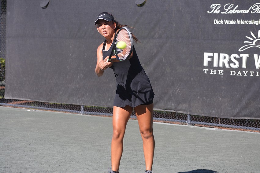 The University of Central Florida's Monica Matias returns a shot against Josie Kuhlman. Matias fell in the championship match 6-2, 6-3.