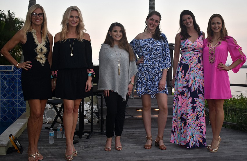 Maryl Henry, Candice Henry, Sydney Glover, Liv Schmitz, Kerry Golumbeck and Lauren Henry model Lilly Pulitzer clothing during the event.