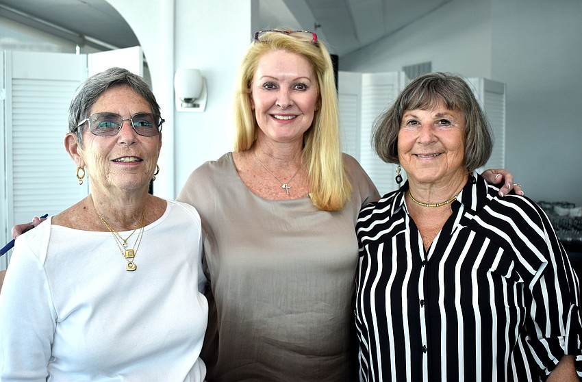 Former club President Madelyn Spoll, current Garden Club President Susan Phillips and former President Jackie Salvino