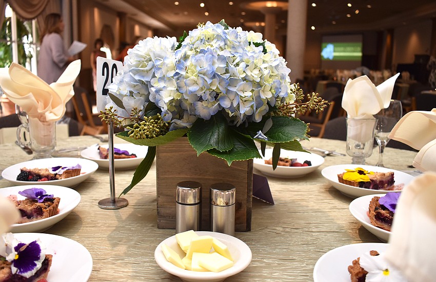 Floral centerpieces adorned every table at the luncheon.