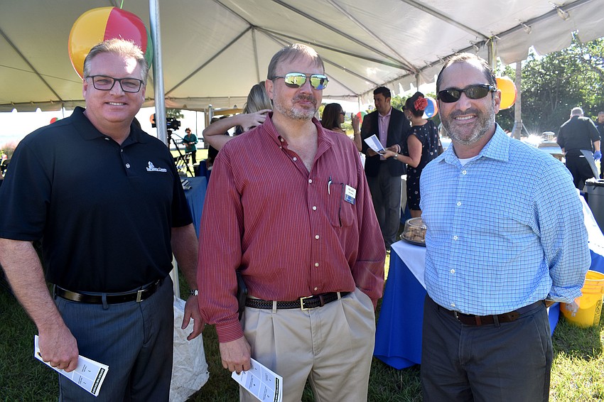 Sarasota County commissioner Mike Moran, Rob LaDue, and Sarasota County Commission Chairman Paul Caragiulo