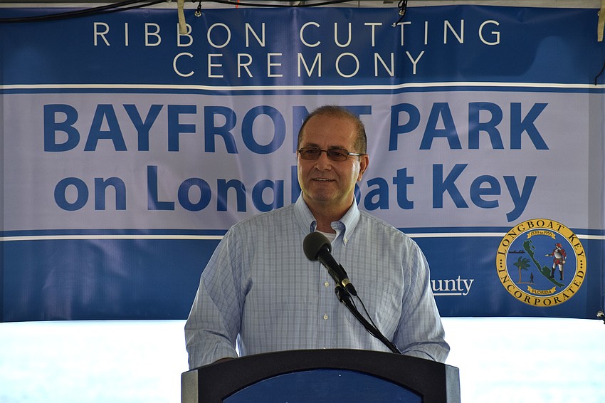 Tom Harmer, Sarasota County Administrator and future Longboat Key town manager, welcomes guest to the Bayfront Park grand opening.