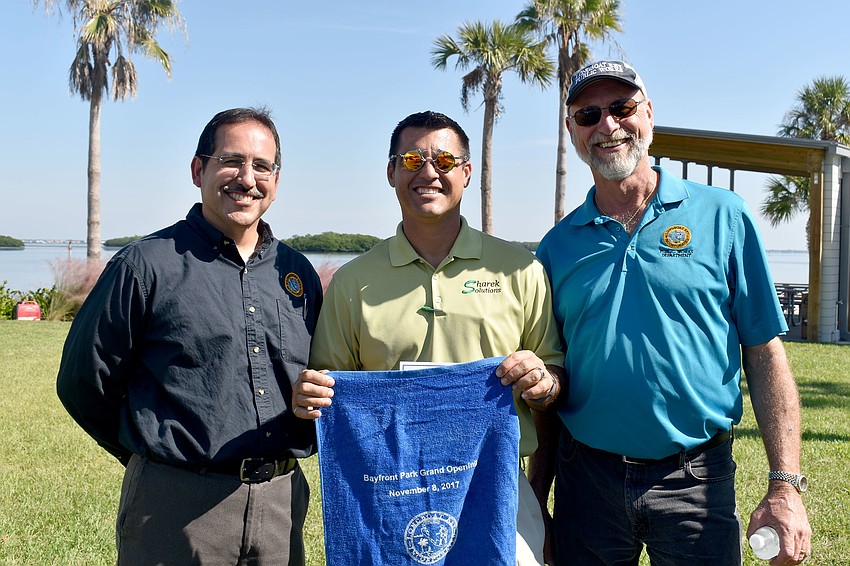 Longboat Key Public Works Director Isaac Brownman, Chris Sharek and Longboat Key Public Works Manager James Linkogle