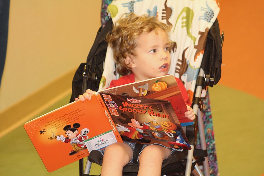 Corbin Durfee, 2, practices for when he is a student at Braden River Elementary.