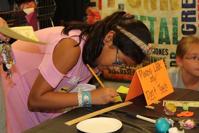 Braden River Elementary fifth-grader Izabella DeToma takes part in the 