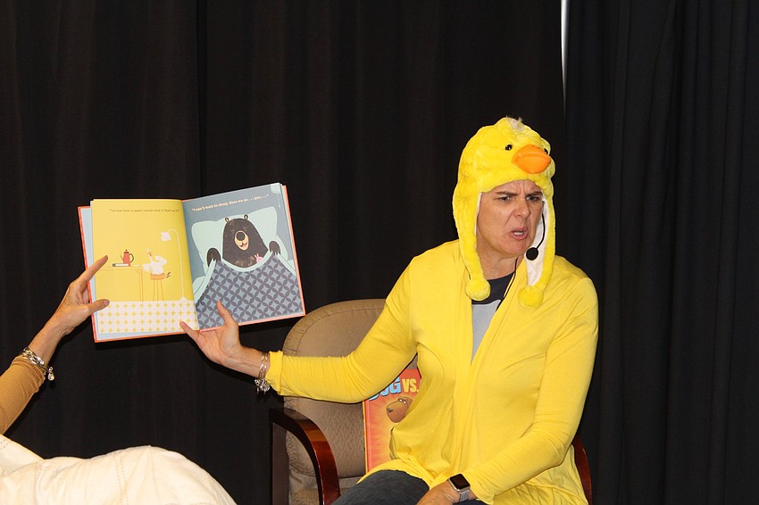 Braden River Elementary Principal Hayley Rio sports a duck suit for her read aloud with students.
