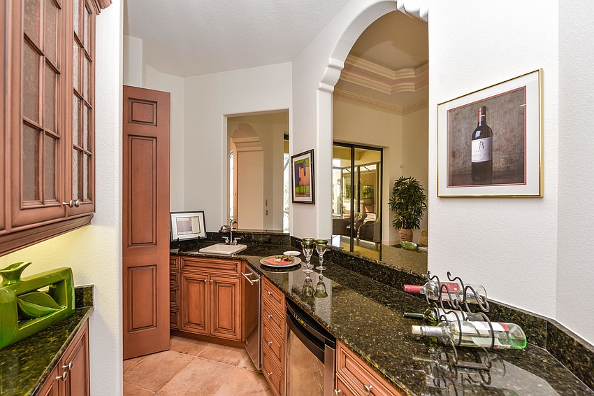 The before look included the arch to the right. The owners renovated and took the arch out, squaring off the opening.