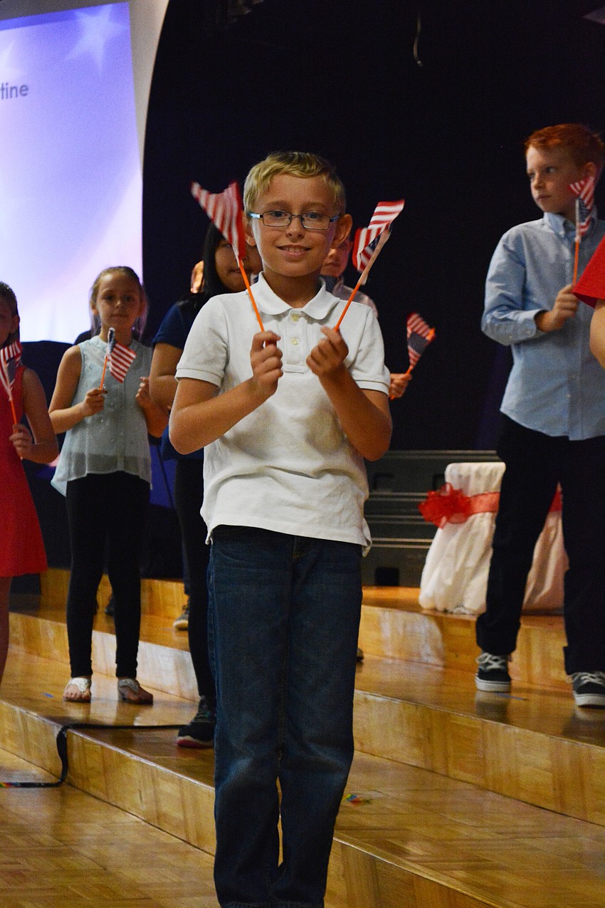 Max McConnell starts the program off with a flag routine.
