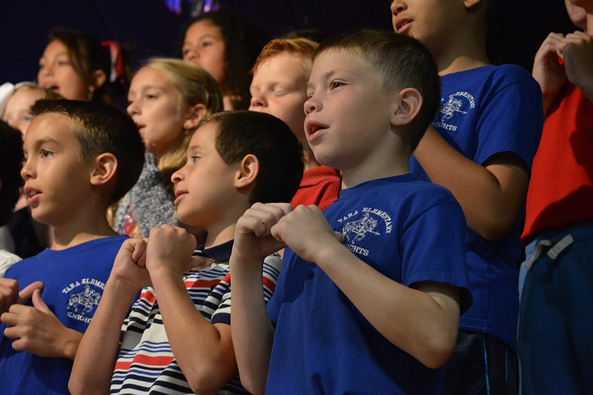 Colton Baughman, Evan Jones  and Jackson Ose sing a version of 