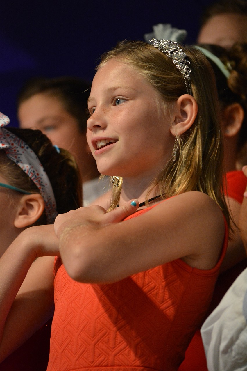 Addison Stennett is all smiles as she performs.